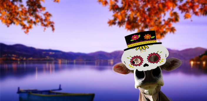 caw with a skeleton mask (dia de los muertos) with a boat on a lake background with fall leaves.